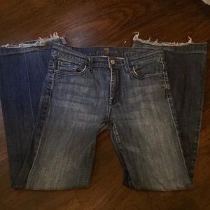 used bell bottom jeans they are frayed at the bottom